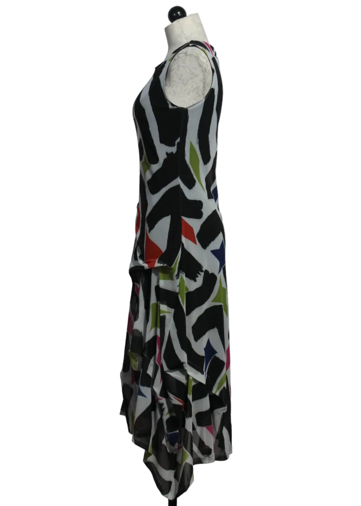 side view of The sleeveless Colony Dress by Kozan in a beautiful colorful GEO print