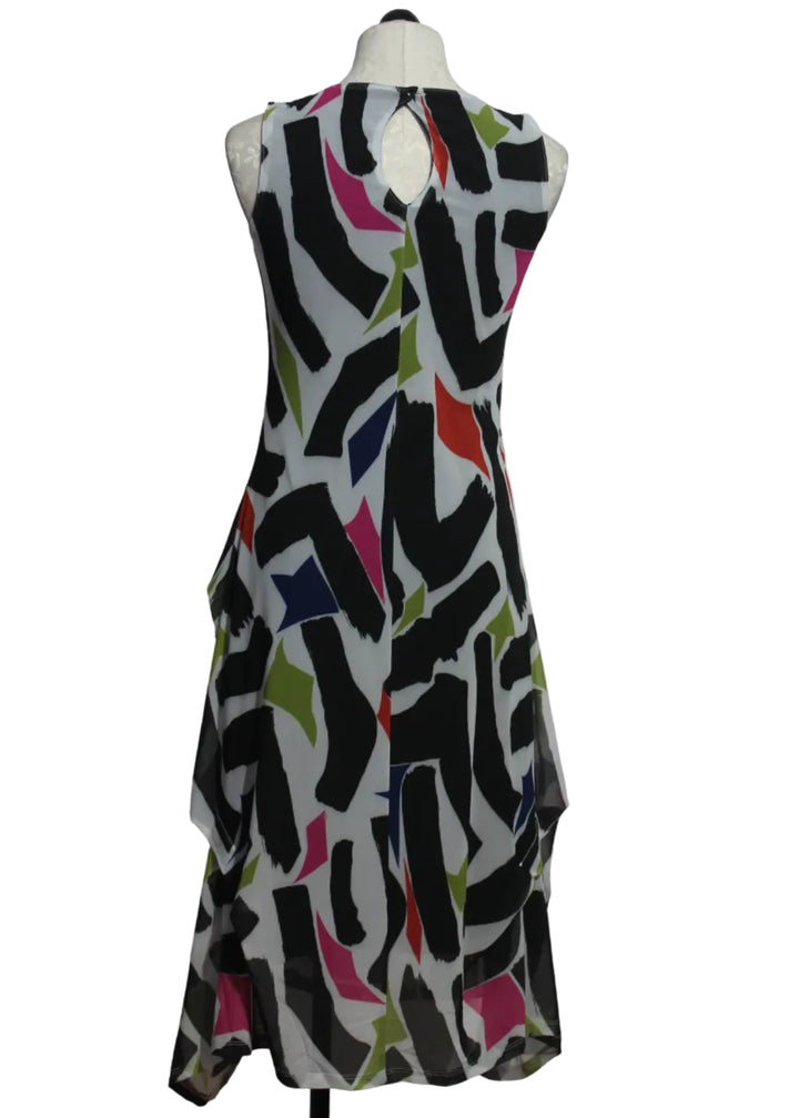 back view of The sleeveless Colony Dress by Kozan in a beautiful colorful GEO print