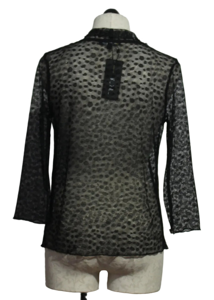 back view of The sheer black polka dot Meem Jacket by Kozan is an effortless black unlined sweater jacket
