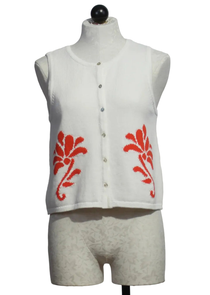 Off-White sleeveless button-down Freesia Top by Melissa Nepton with with an orange jacquard design on each front side 