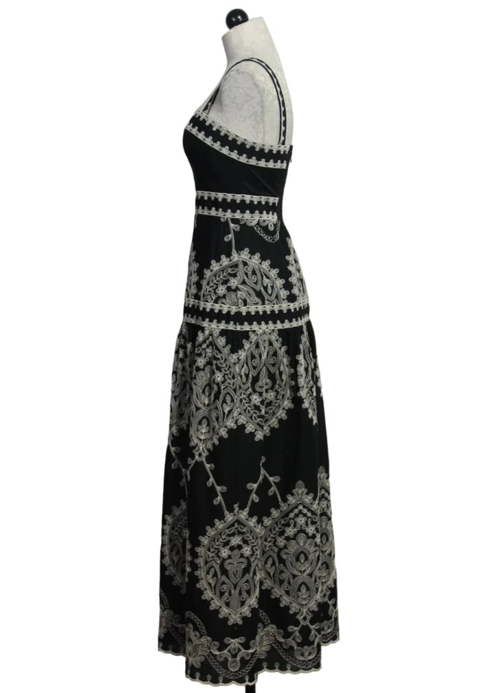 side view of Noir colored Embroidered Adair Midi Dress by Cartolina 