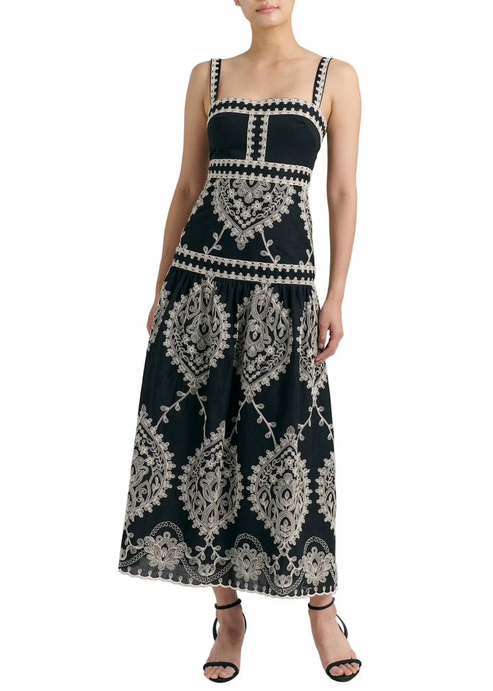 model wearing the Noir colored Embroidered Adair Midi Dress by Cartolina 