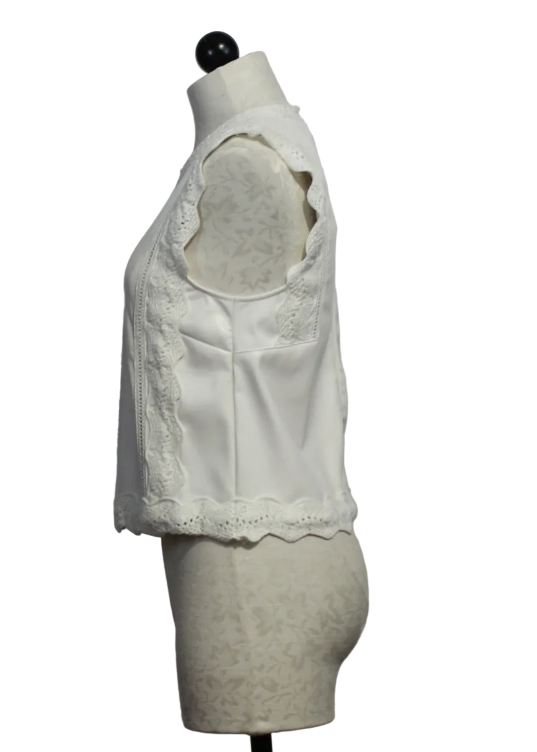 side view of Cream colored Sleeveless Attie Top by Melissa Nepton with Crocheted Edging