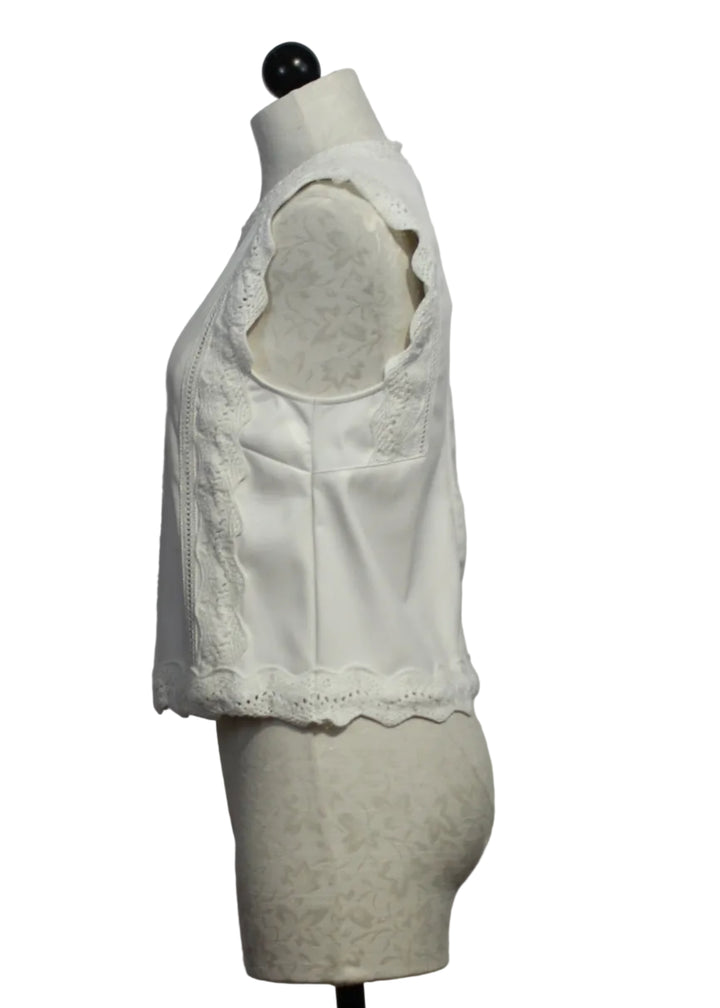 side view of Cream colored Sleeveless Attie Top by Melissa Nepton with Crocheted Edging