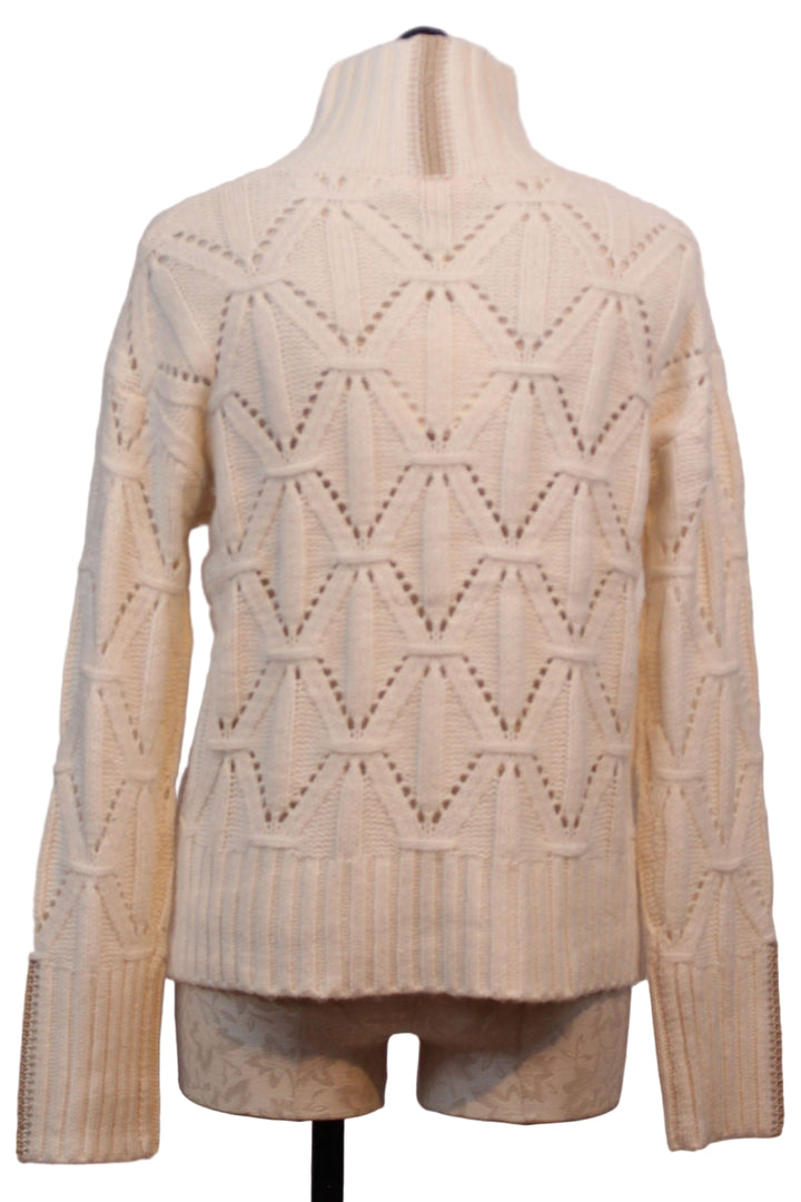 back view of The Stand Out Sweater by Lisa Todd in Winter White