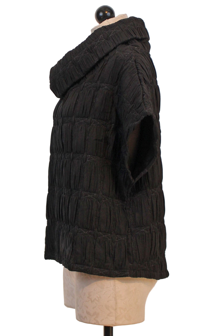side view of Black Smocked Suki Top by Kozan