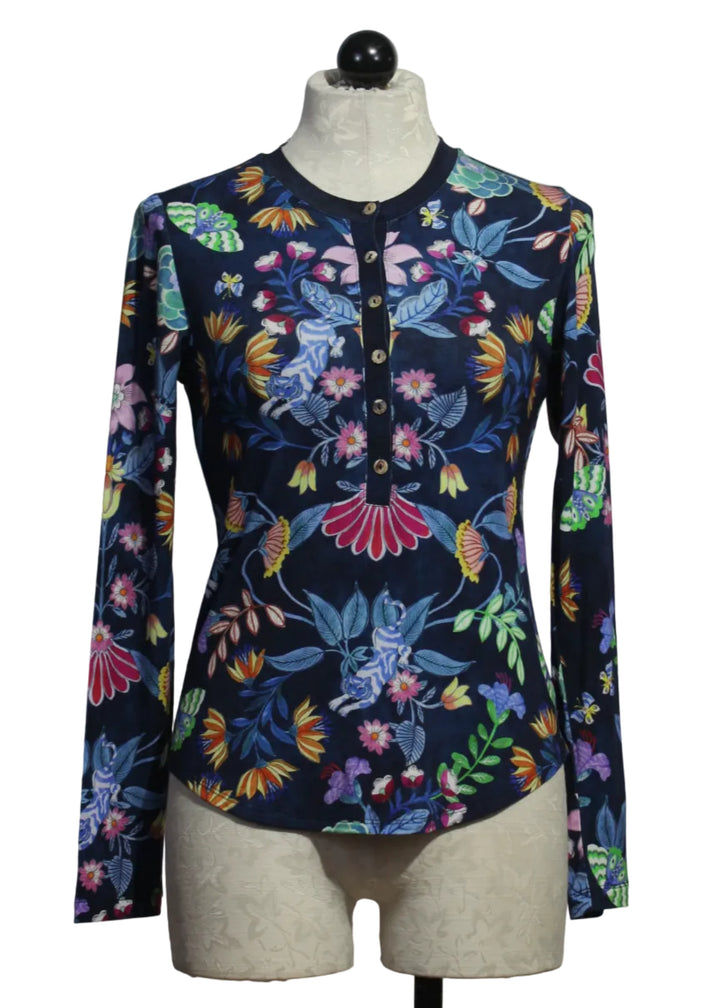 The Long Sleeve Fitted Henley Tee by Johnny Was in the bright blue floral Rosemary print