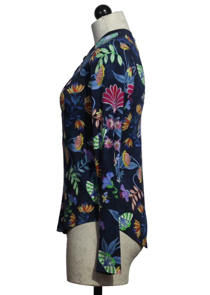 side view of The Long Sleeve Fitted Henley Tee by Johnny Was in the bright blue floral Rosemary print