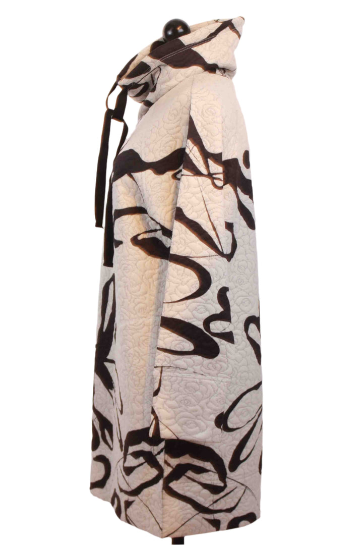 Side view of Beige and Black Quilted Rolled Neck Scatter Print Tunic by Inoah