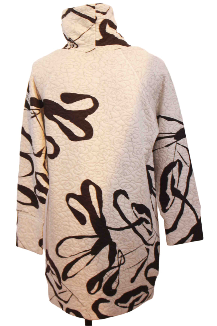 back view of Beige and Black Quilted Rolled Neck Scatter Print Tunic by Inoah