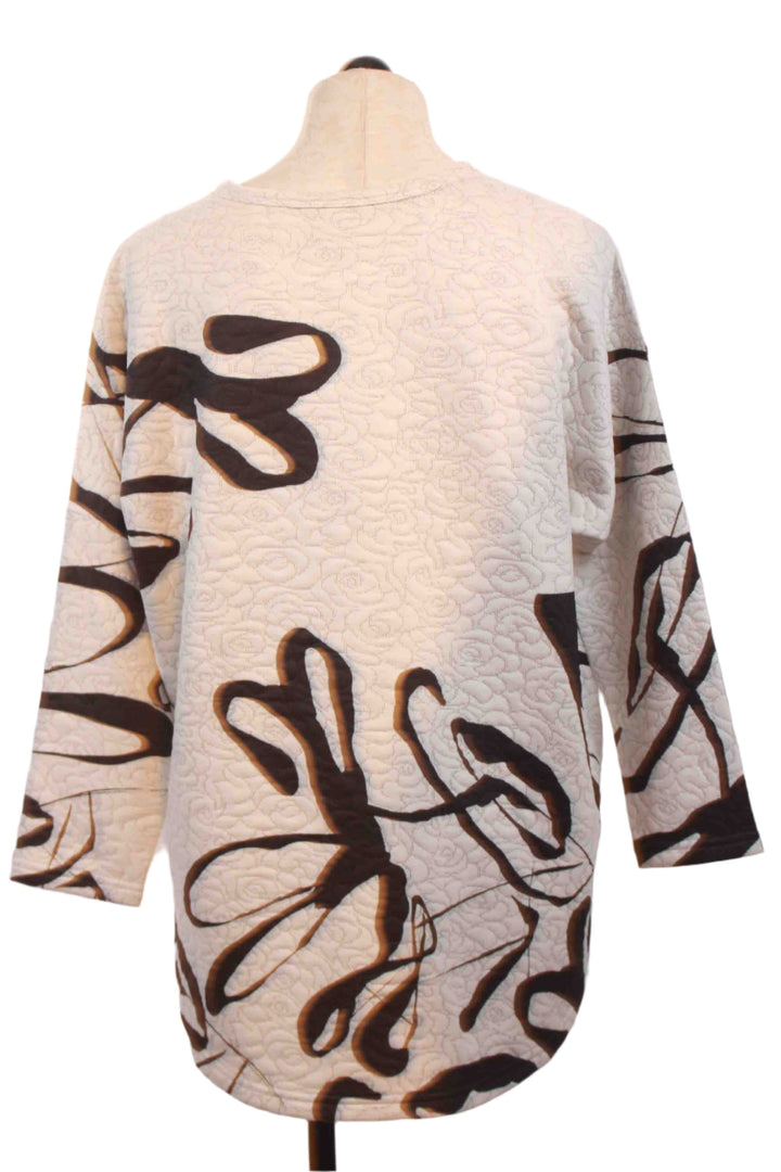 back view of Black and white Scatter Print Long Sleeve Flared Hi Lo Top by Inoah