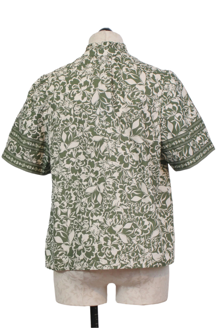 back view of Fiorella Print Talia Short Puff Sleeve Button Ruffle Neck Top by Cartolina