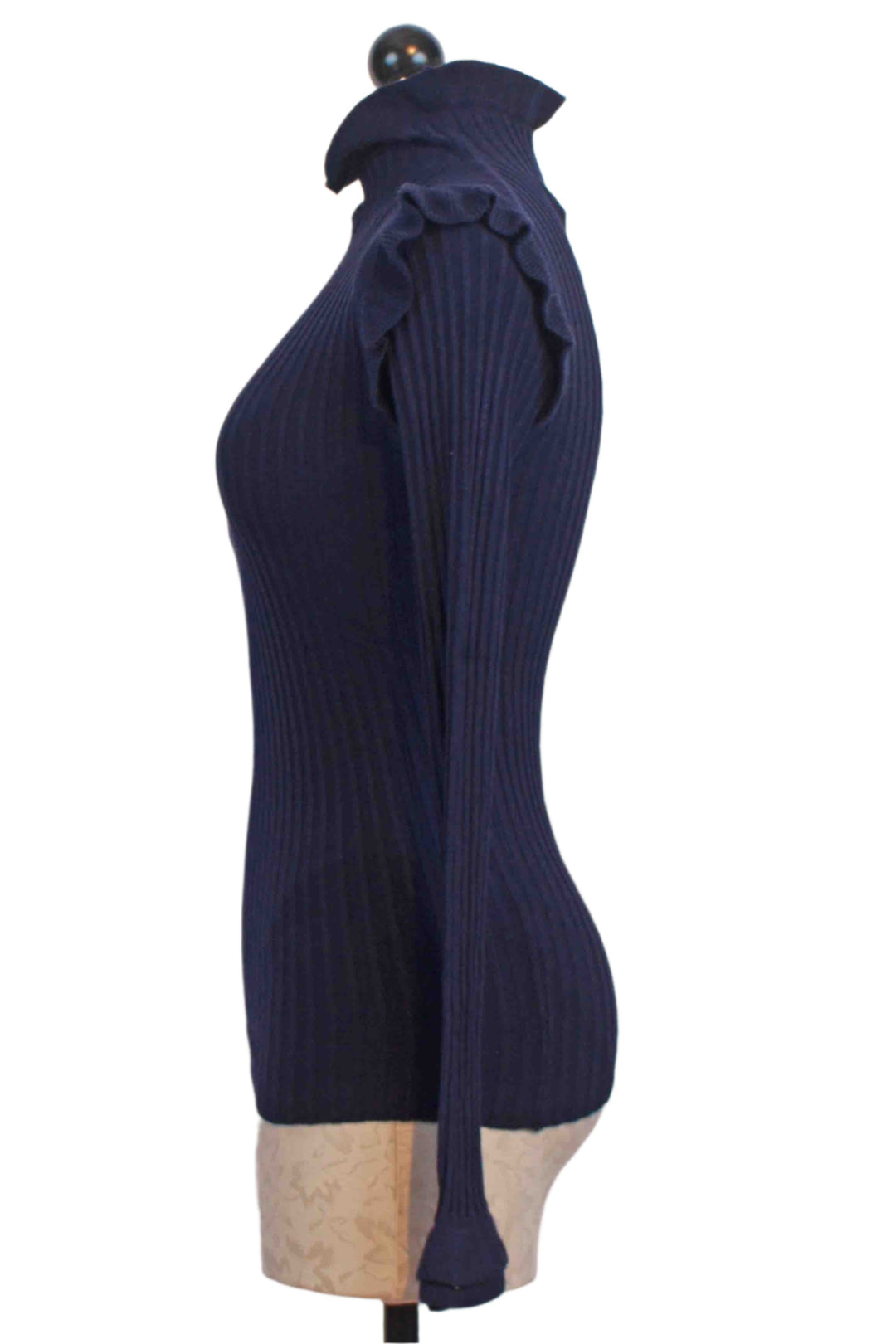 side view of Dusk ribbed Turtleneck by Marie Oliver with tiny ruffle shoulder neckline and bottom of sleeve