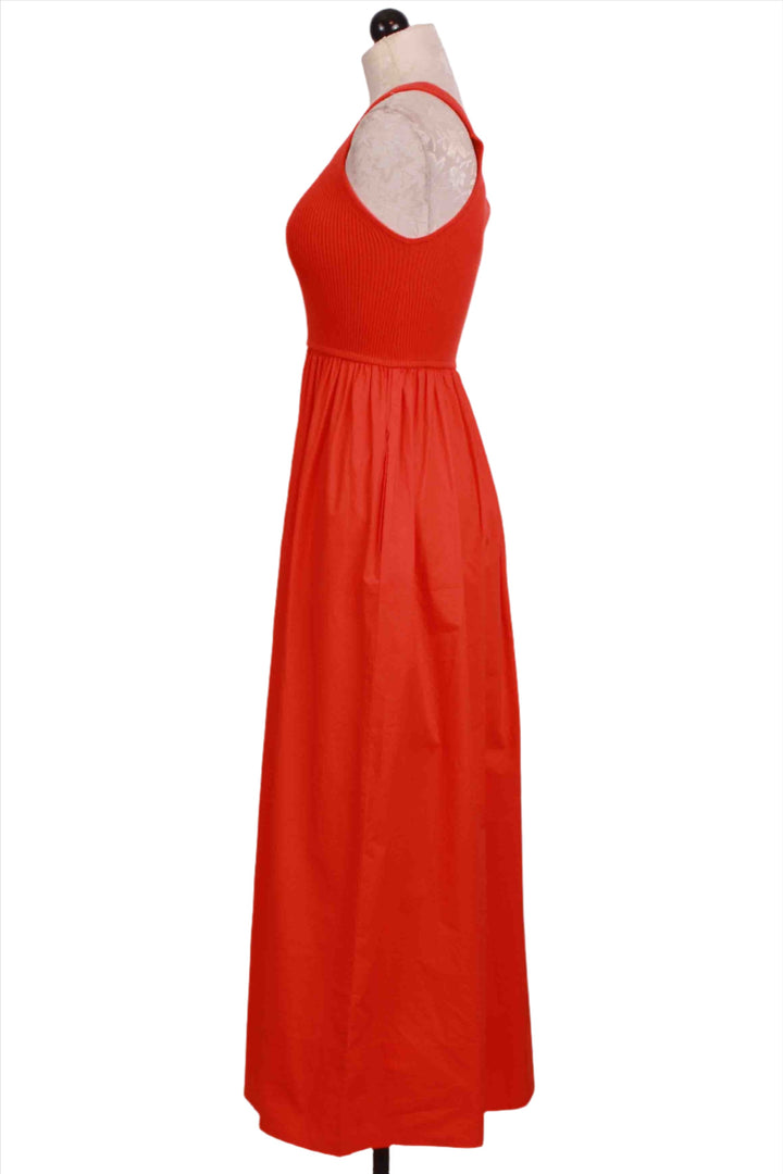 side view of Fuego colored One Shoulder Fitted Ribbed Bodice Tobie Dress by Marie Oliver with a Cotton Poplin Full Skirt