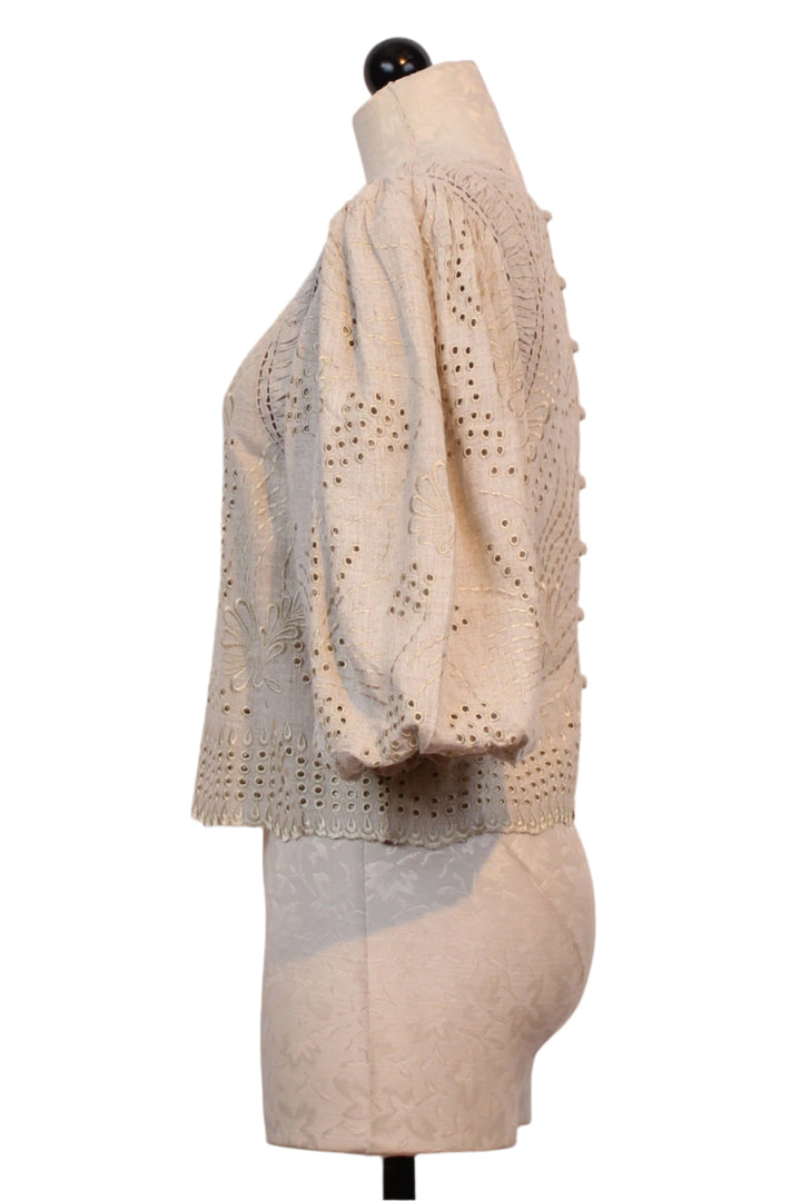 side view of Light Khaki Trinity Embroidered Crop Top by Berenice with pretty 3/4 blouson sleeves