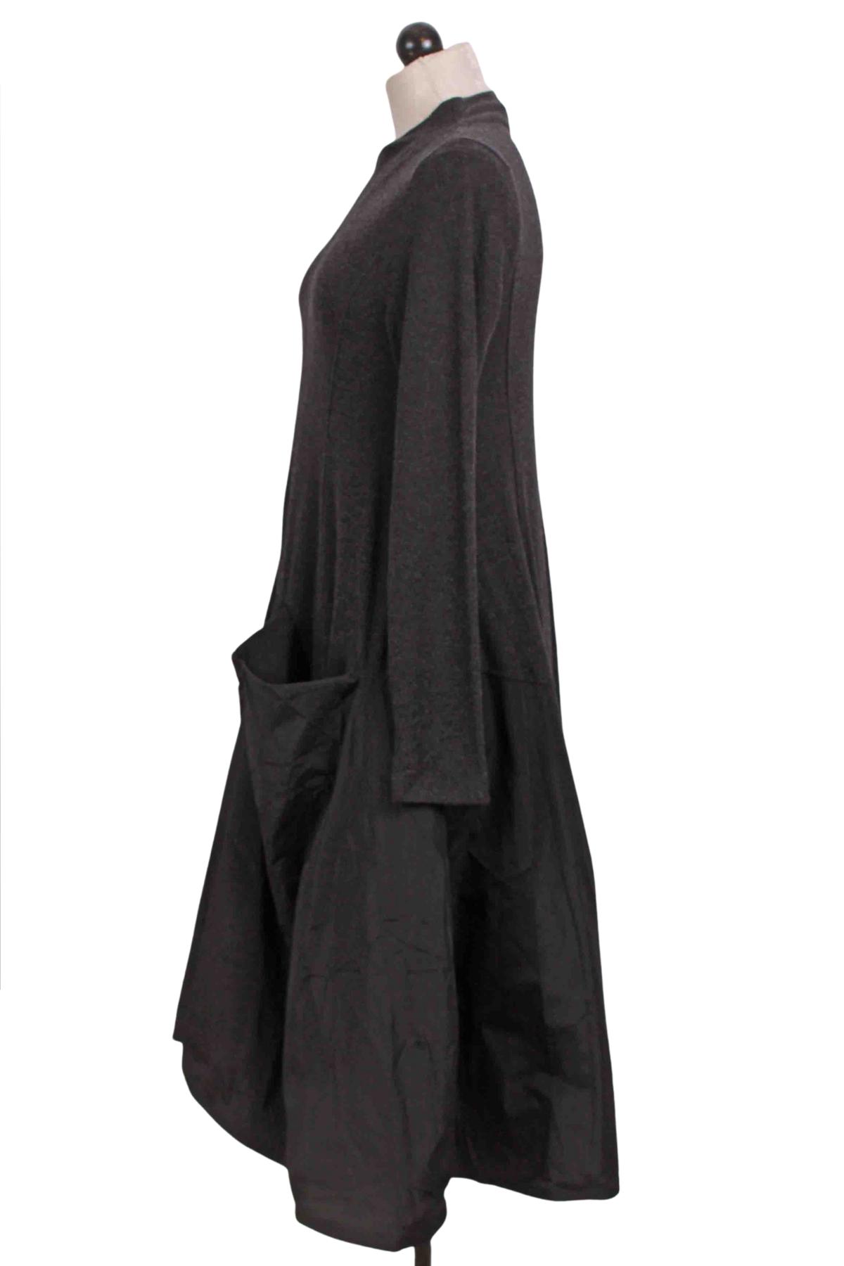side view of Charcoal Urban Mixed Fabric Dress by Alembika with a mock neck and taffeta skirting