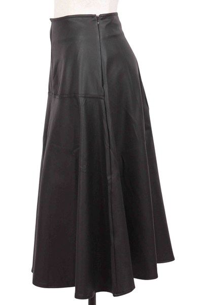 side view of Black Vegan Leather Godet Skirt by Isle by Melis Kozan