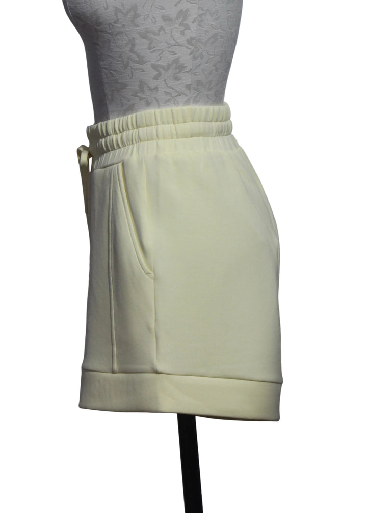 side view of The Anise Flower Atrium High Rise Short 4.5 by Varley 