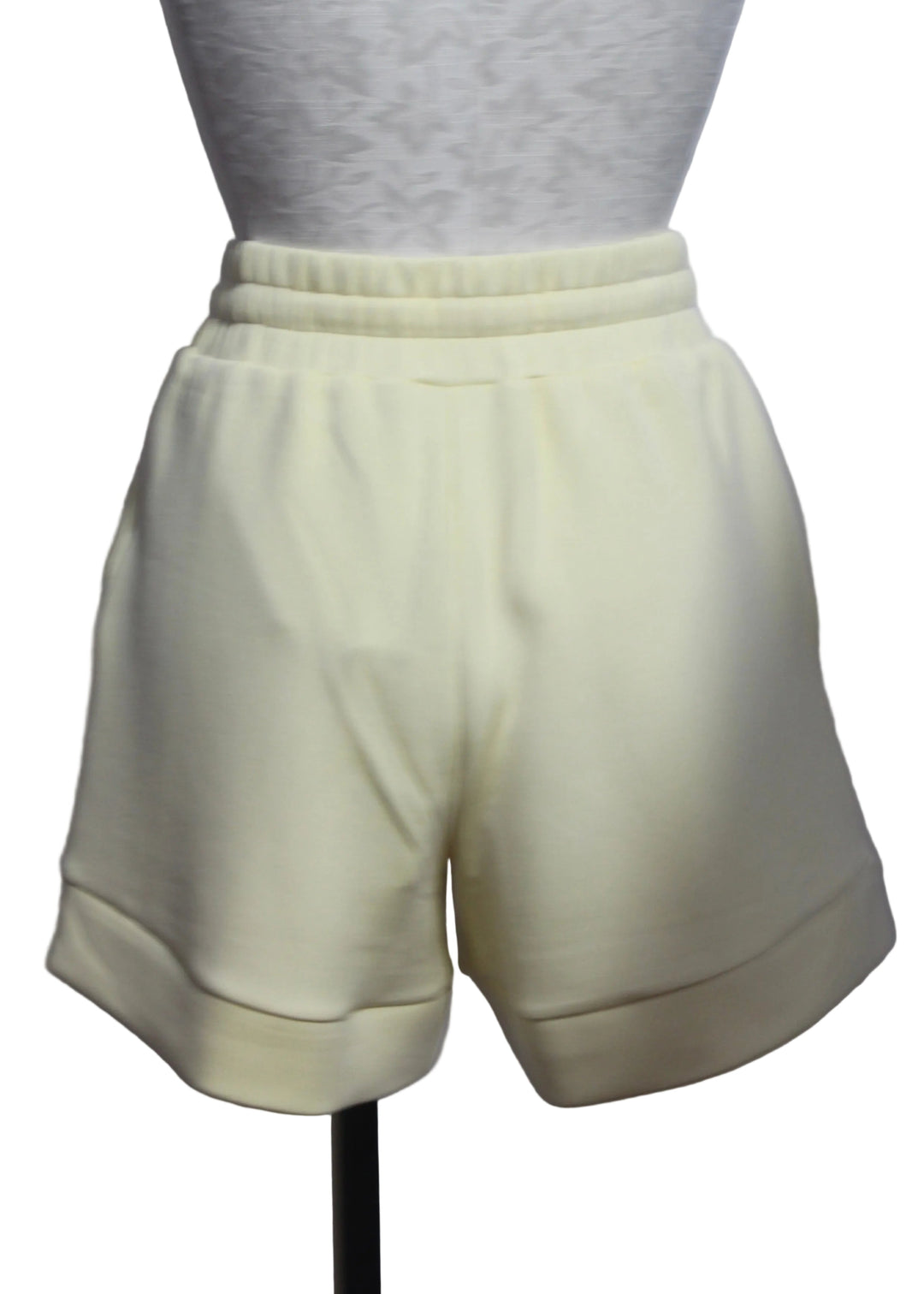 back view of The Anise Flower Atrium High Rise Short 4.5 by Varley 