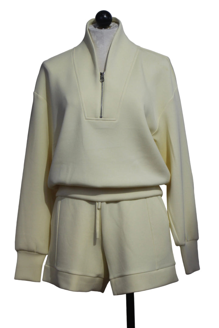 The Anise Flower Atrium High Rise Short 4.5 by Varley paired with the matching Davidson Sweater by Varley