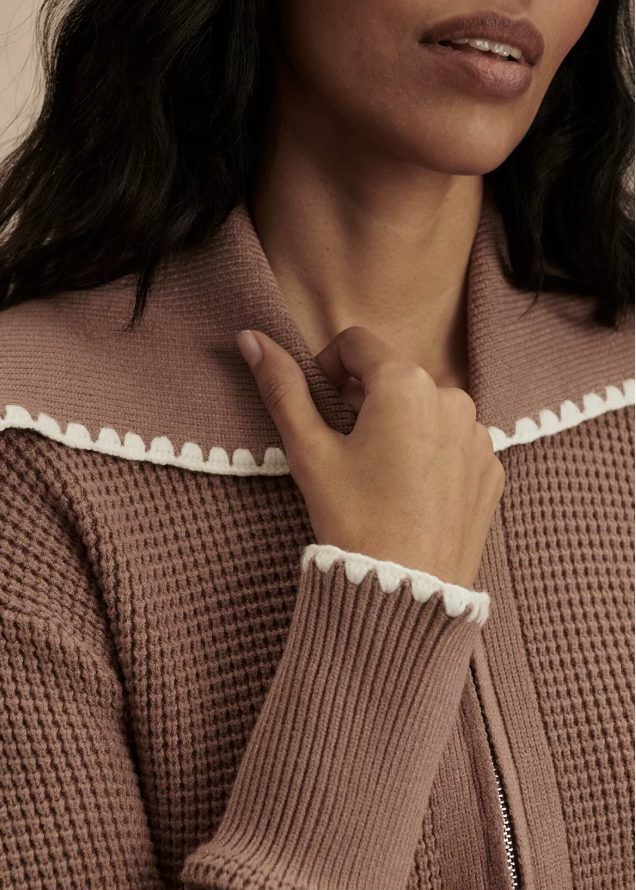 Closeup view of Ginger Snap Colored Sibley Soft Knit Zip Front Jacket by Varley