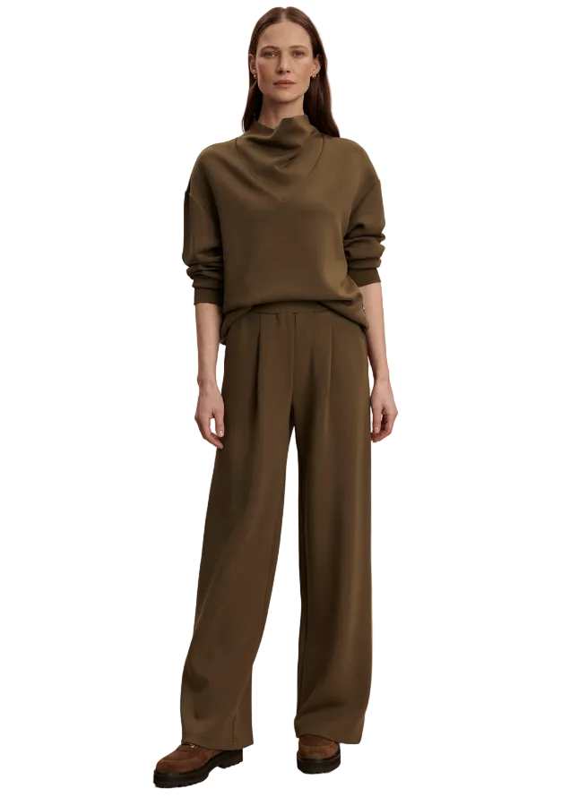 model wearing The Extra Wide Leg Pant 29.5 by Varley in Military Olive