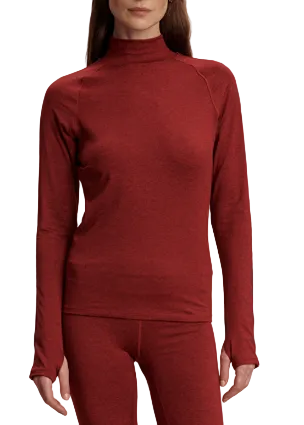 The Always Warm Mock Neck Baselayer by Varley in Red Dahlia Marl showing thumb holes cuffs