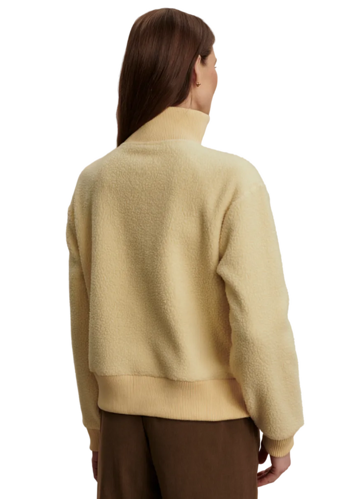 back view of Reed Yellow Jaylin Half Zip Fleece by Varley