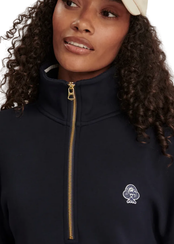 Front logo of The Bertie Half Zip Sweat by Varley 
