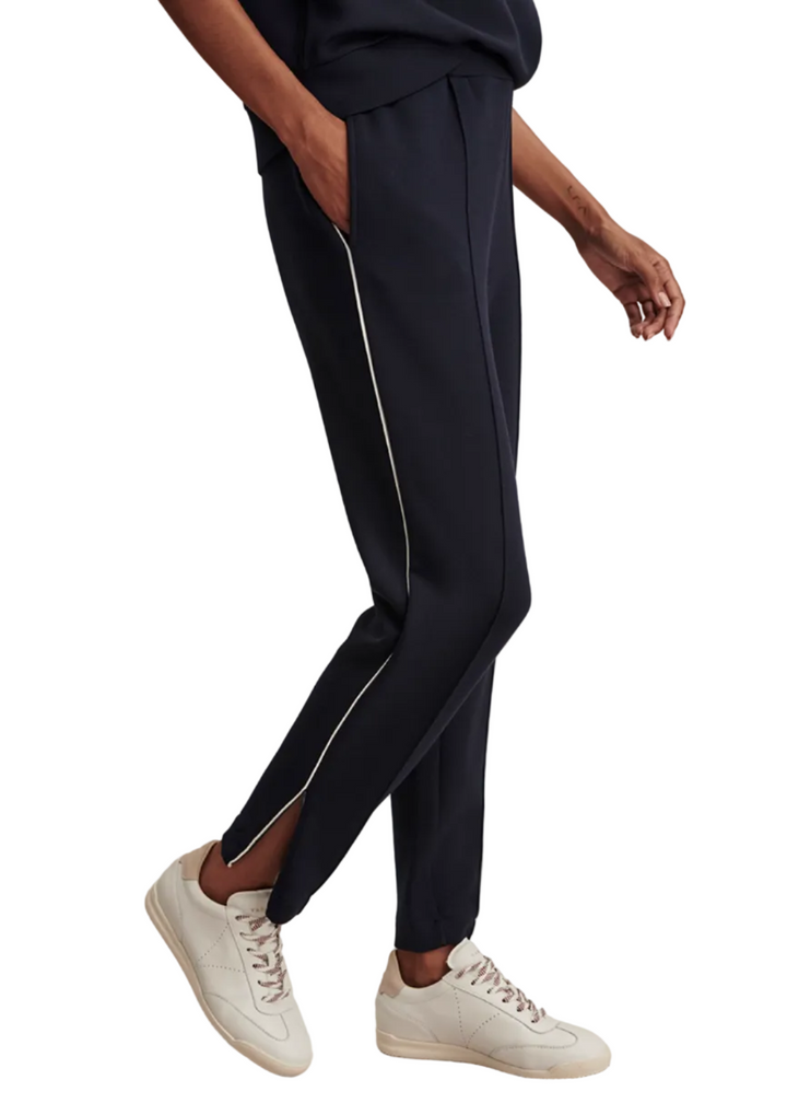 side view of Navy Slim Pintuck Pant 27.5 by Varley