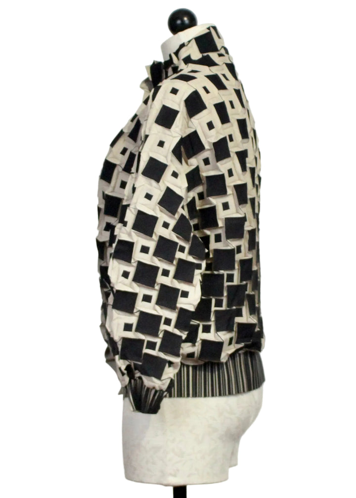 Side view of The Black and White Zamora Textured Jacket by Wild Cosmos