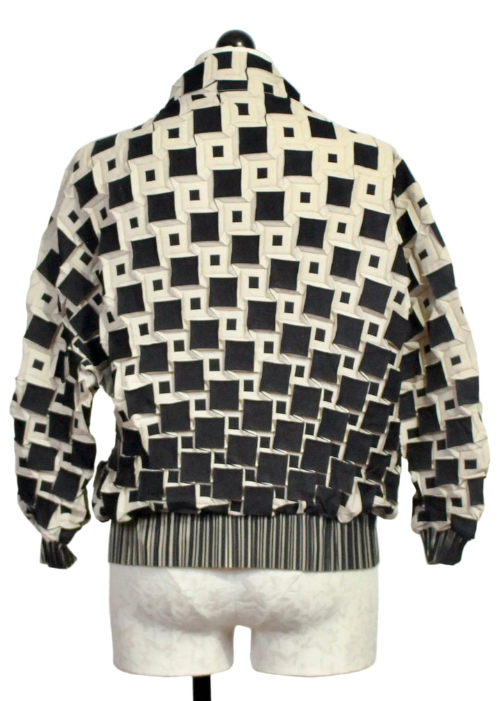 Back view of The Black and White Zamora Textured Jacket by Wild Cosmos