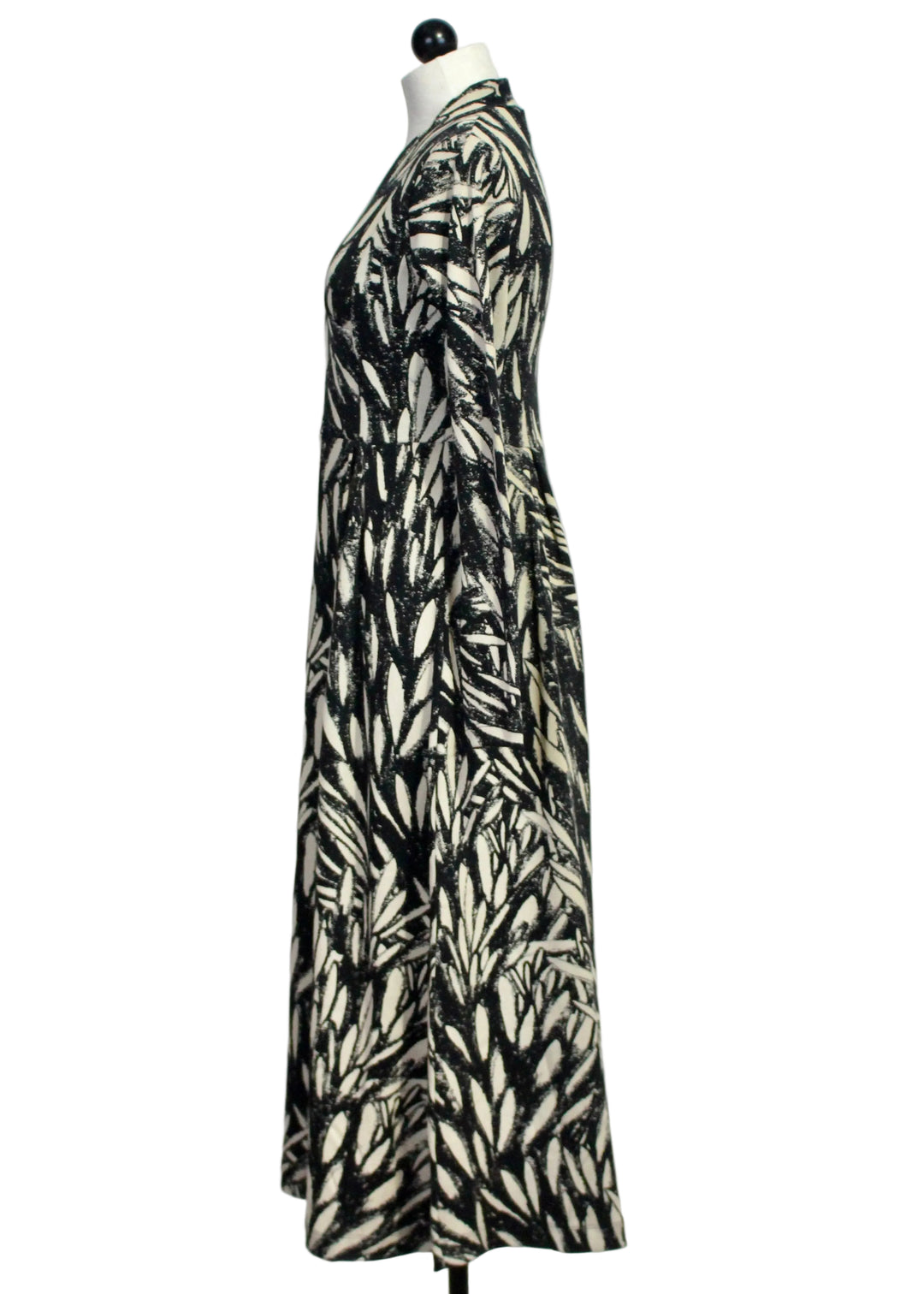 Side view of The Eba GOTS Dress by SKFK in the Leaves Print