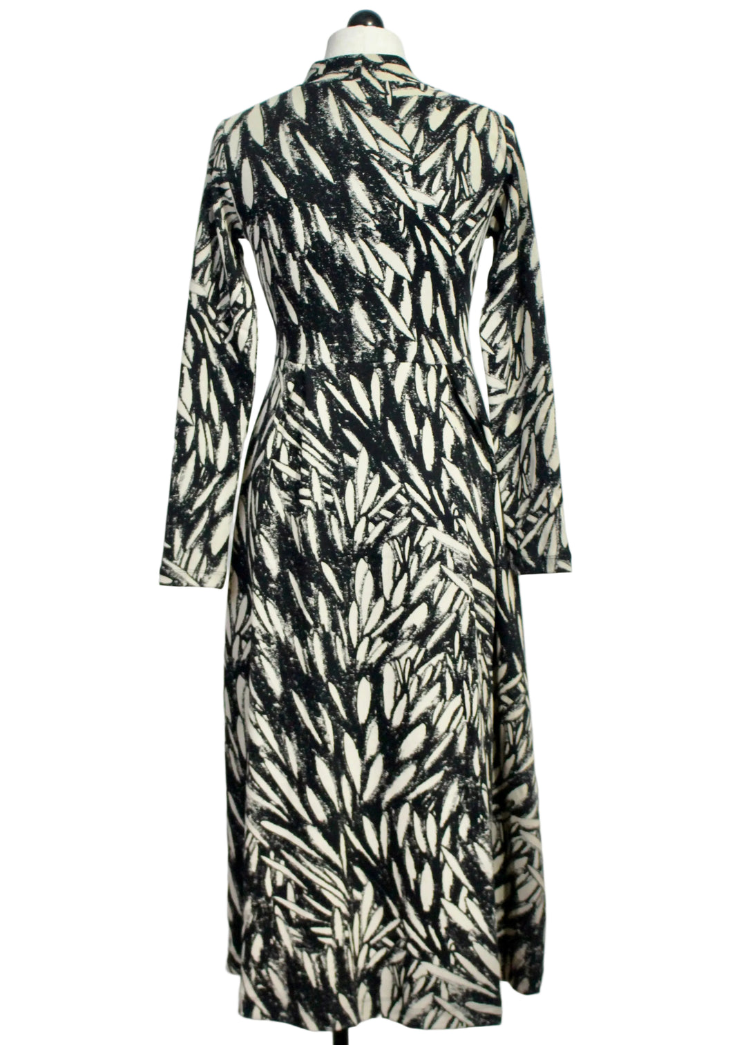 Back view of The Eba GOTS Dress by SKFK in the Leaves Print