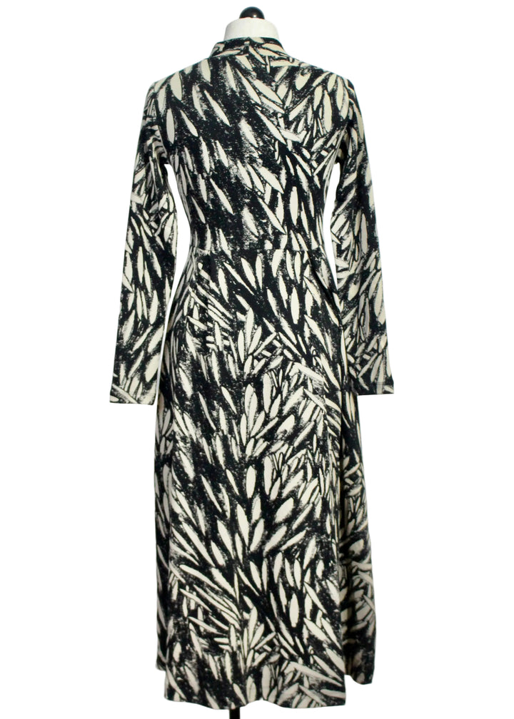 Back view of The Eba GOTS Dress by SKFK in the Leaves Print