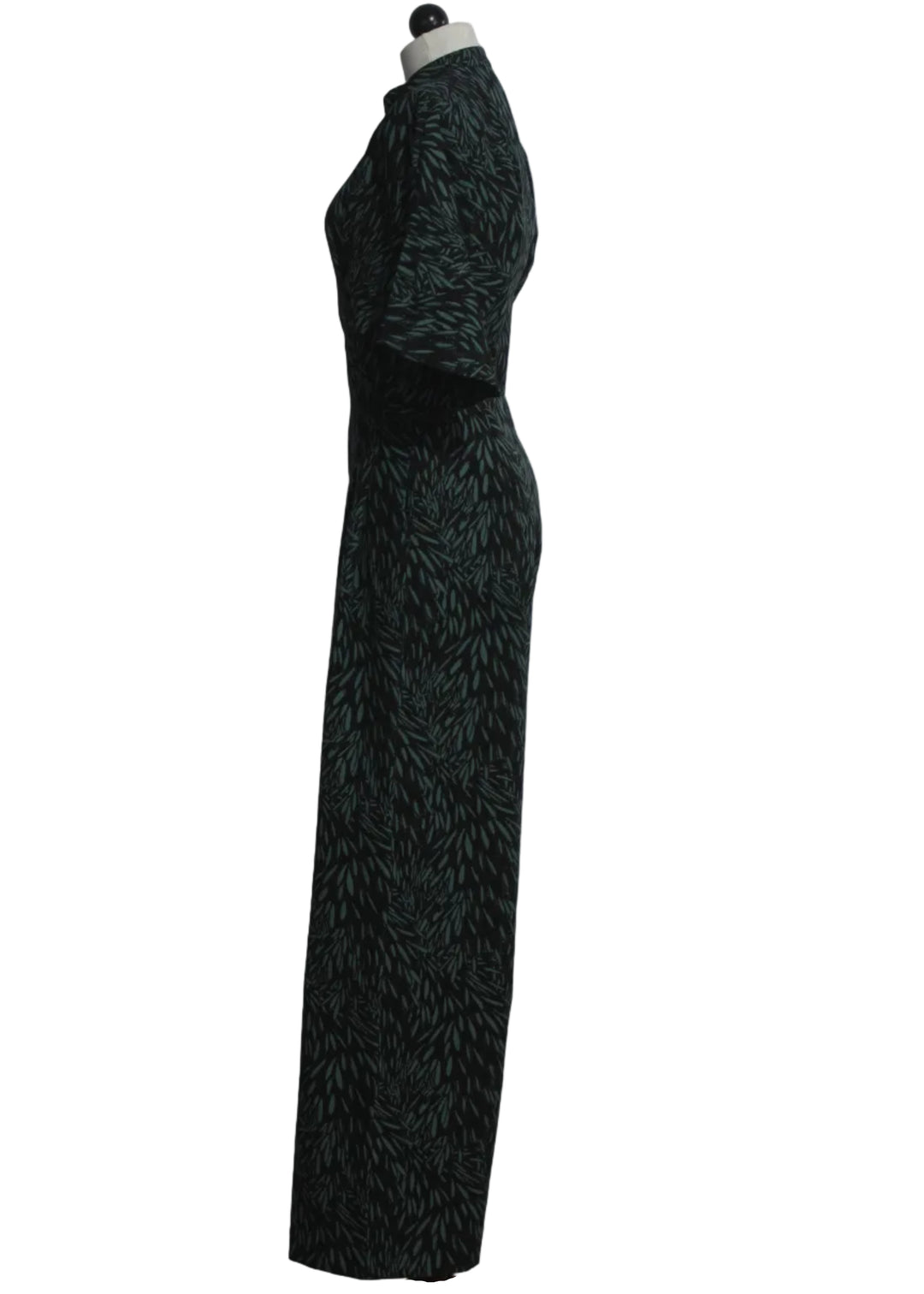 side view of The Siloe Jumpsuit by SKFK in the green Leaves print