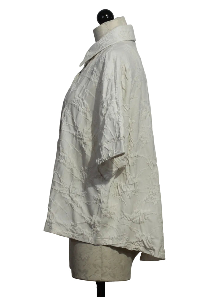 side view of the Resort white colored Princess Shirt by Kozan is a short sleeve textured button-up