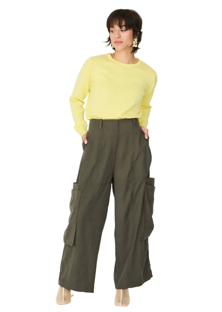 model wearing The Taupe Aines Trouser by SKFK