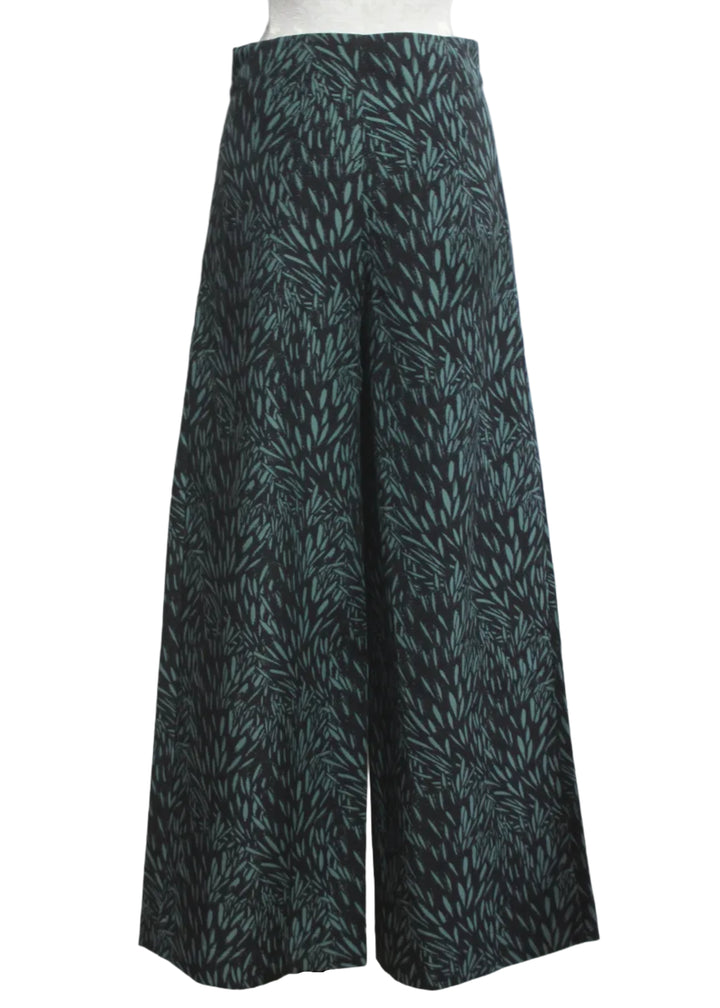 back view of The Basabe Trouser by SKFK in the artistic Leaves pattern