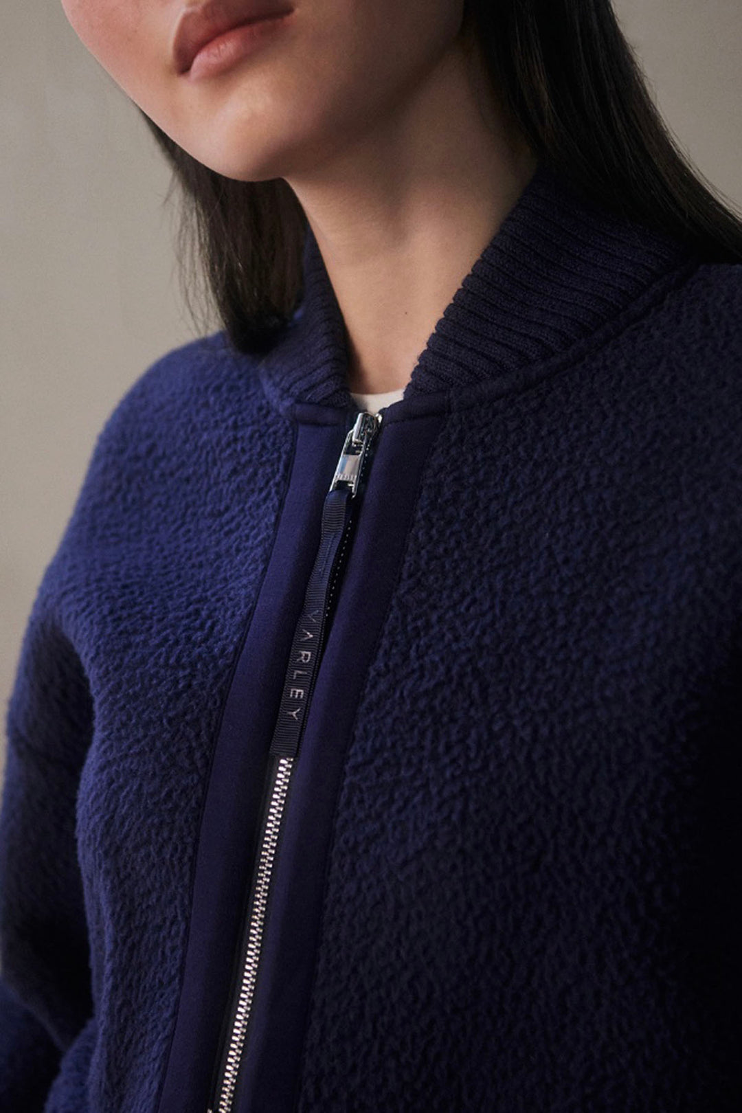 close up view of The Willmont Patch Pocket Fleece by Varley in Evening Blue