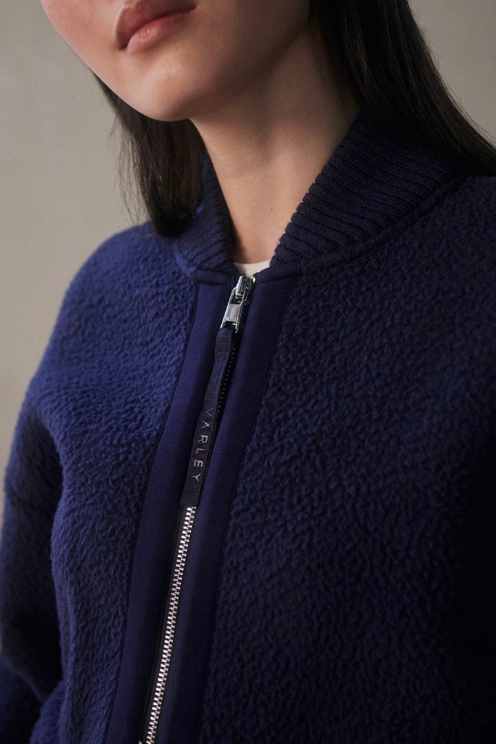 close up view of The Willmont Patch Pocket Fleece by Varley in Evening Blue