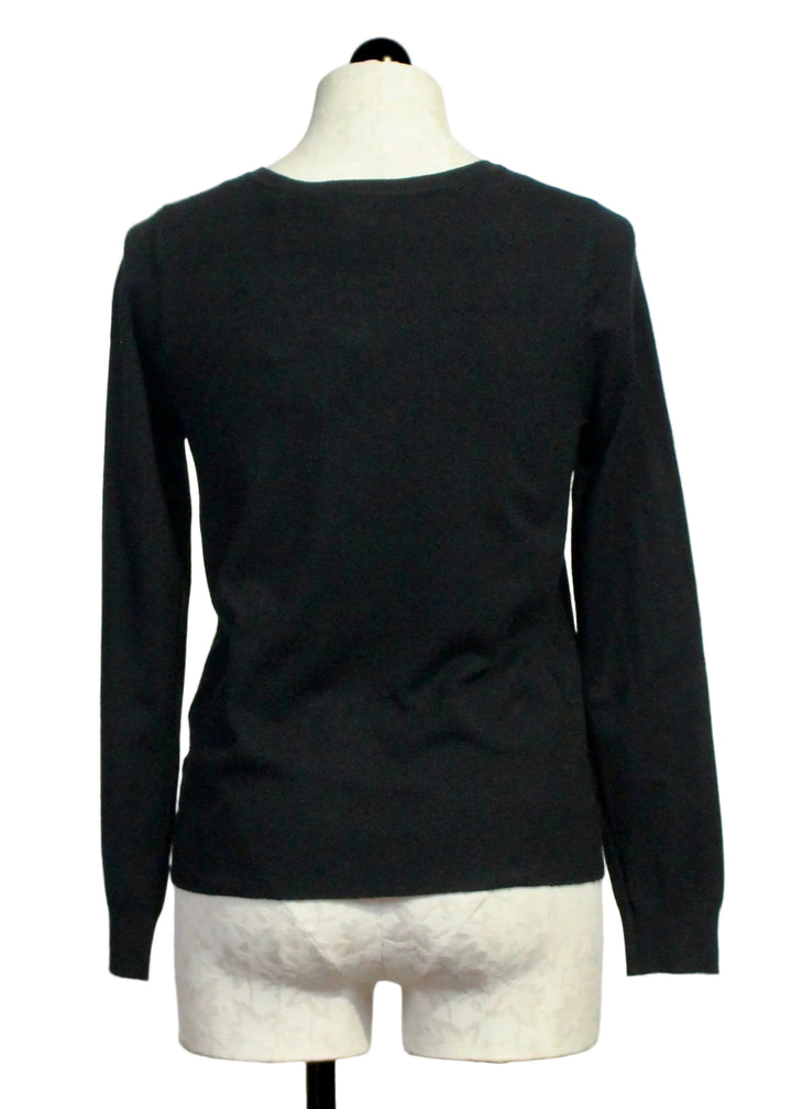 Back view of The Classic Black Cardigan by Alison Sheri 
