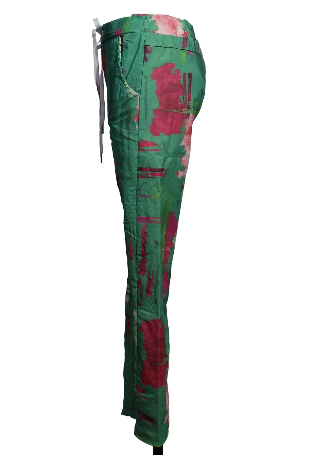 side view of Crinkled Drawstring Pant in a Pink and Green Abstract Parrot Print by Amorosa