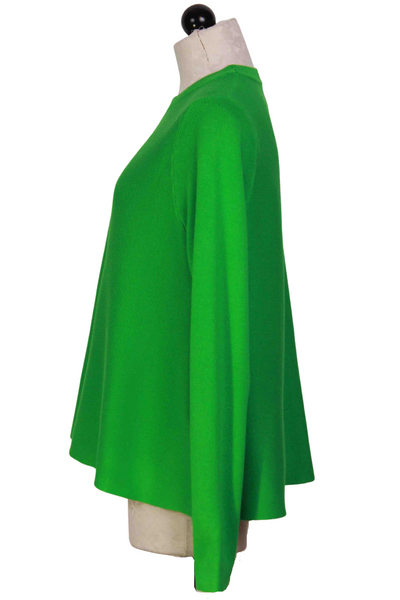 side view of Green Cropped Flared Sweater by Compania Fantastica
