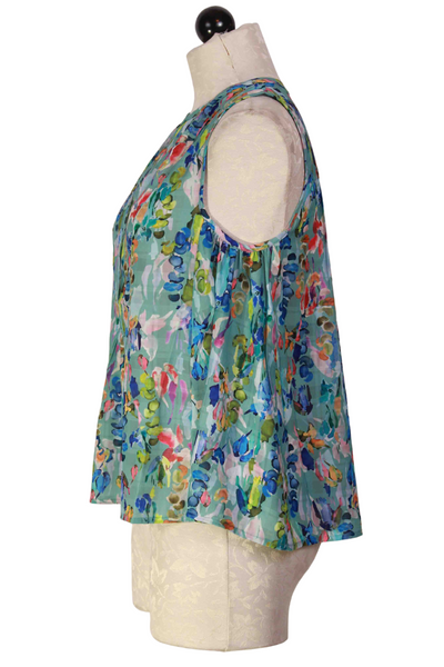 side view of Sleeveless Peplum Bottom Floral Blue/Multicolor Blouse by The Korner