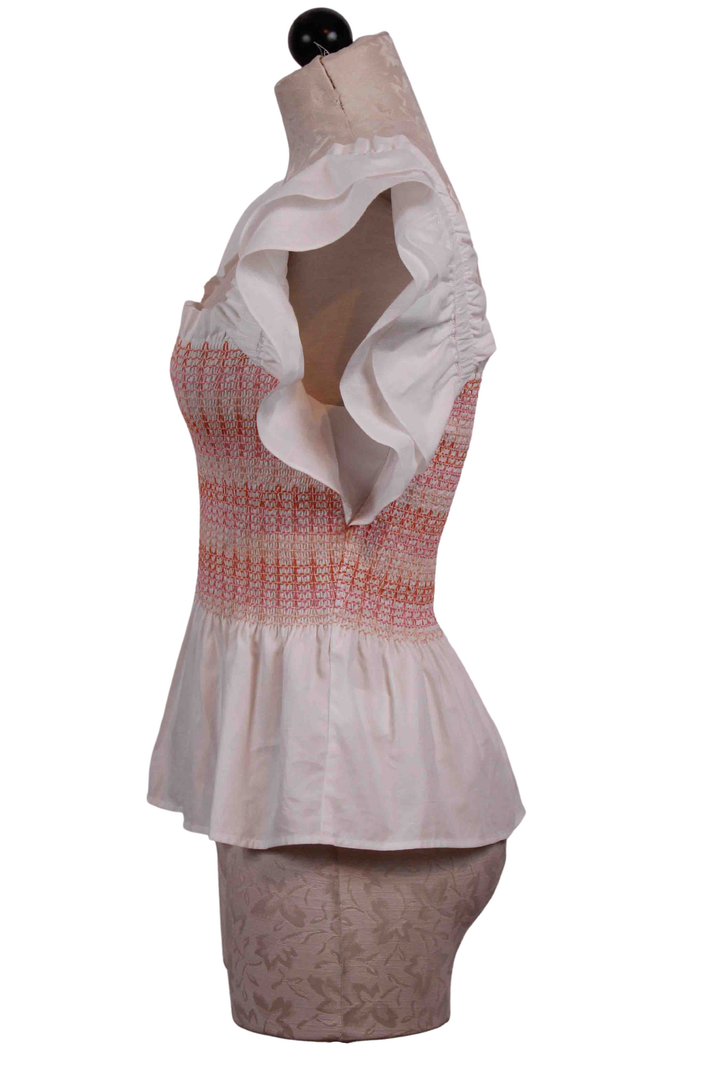 side view of Smocked, Ruffle Sleeve Winnie Top by Marie Oliver in Bellini