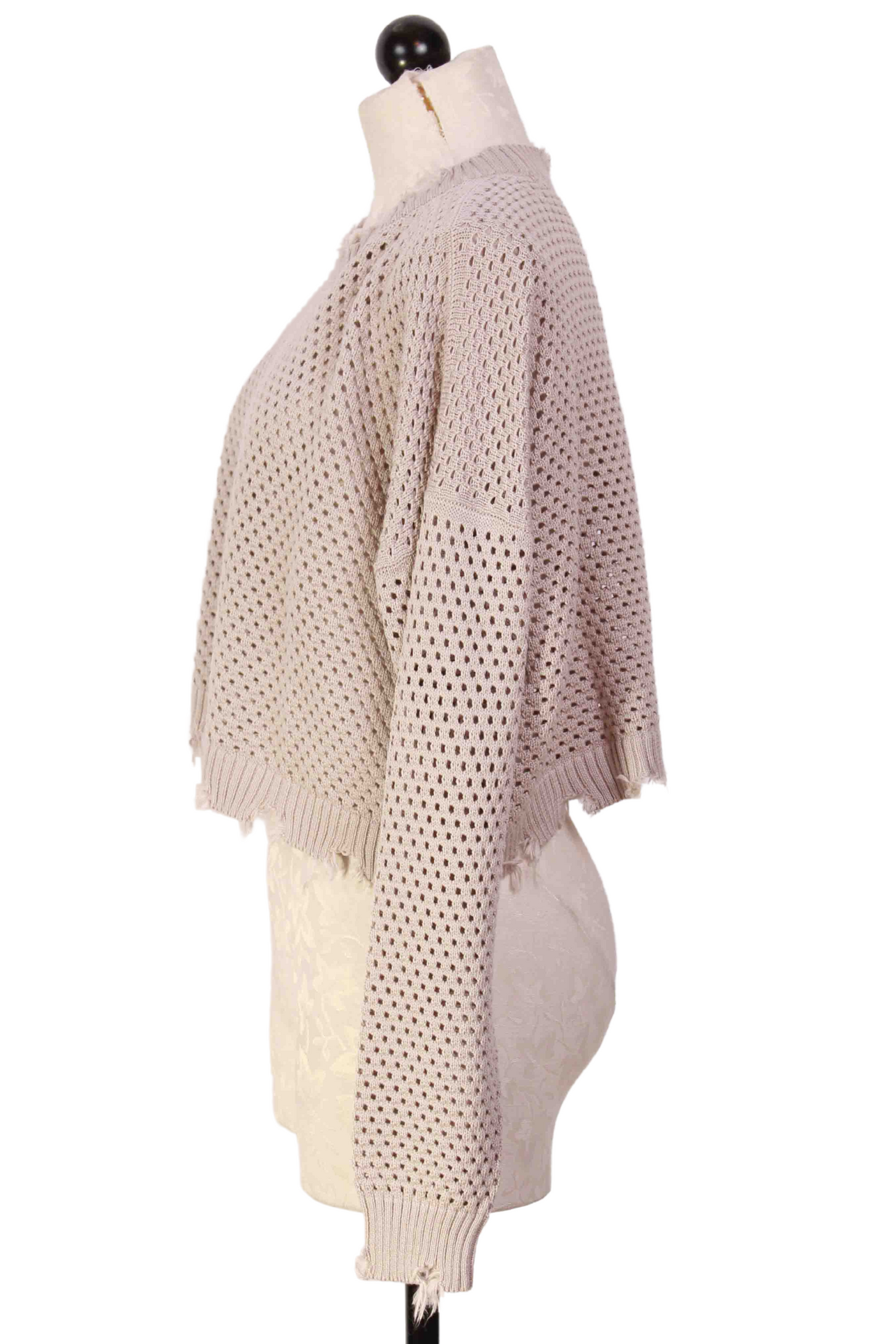 side view of Putty Raw Edge Pin Dot Sweater by Planet