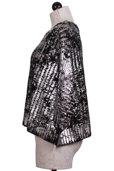 side view of Black and Silver Metallic Crochet Sweater by Planet