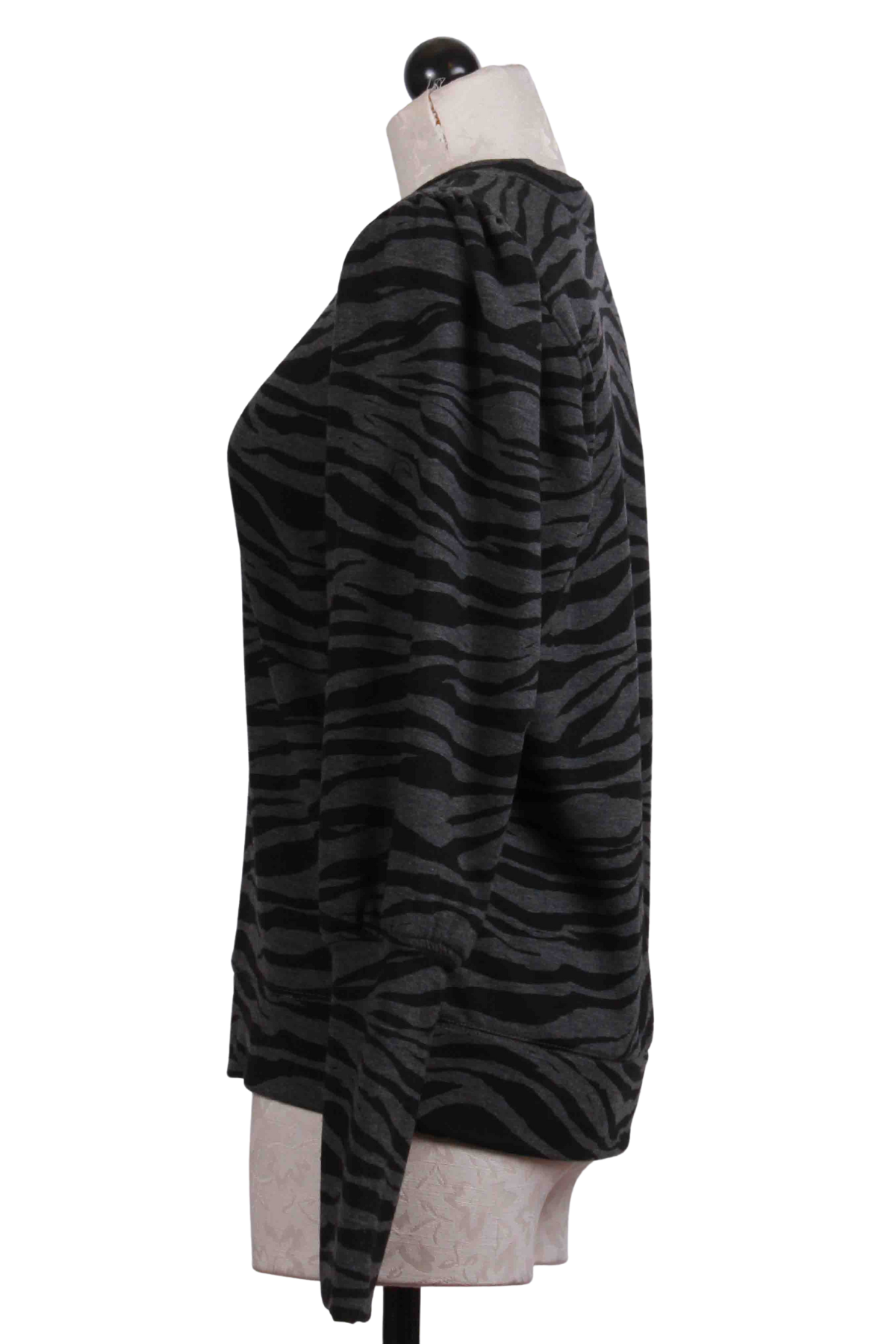 side view of Zebra Print Fleece Bishop Sleeve Top by Fifteen Twenty
