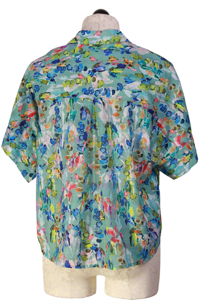 back view of Short Sleeve Floral Blouse by The Korner